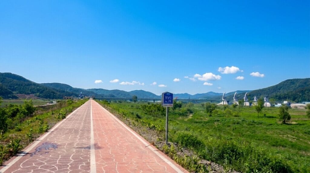 Nakdonggang Bicycle Path (Lower) approaching Hapcheon-Changnyeong Weir with its distinctive fan-shaped gates